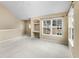 Loft area with built-in desk and shelves, plus a large window for natural light at 3383 Westchester Square Blvd # 204, Orlando, FL 32835