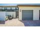 Attached two car garage with brick paved driveway and landscaped surroundings at 8924 Adriatico Ln, Kissimmee, FL 34747
