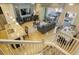 Bright, open-concept living room showcasing modern decor and access to an outdoor pool area at 8924 Adriatico Ln, Kissimmee, FL 34747