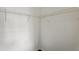 Walk-in closet featuring a basic wire shelf organizer at 5530 Metrowest Blvd # 9-211, Orlando, FL 32811