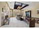 Lobby with large format tiles, seating, and an entertainment center at 5530 Metrowest Blvd # 9-311, Orlando, FL 32811