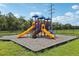 Colorful playground with multiple slides and climbing structures for children to enjoy outdoor activities at 5530 Metrowest Blvd # 9-311, Orlando, FL 32811