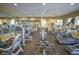 Well-equipped fitness center with modern exercise machines, weights, and mirrored walls for a comprehensive workout experience at 6451 Old Park Ln # 110, Orlando, FL 32835