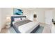 Inviting main bedroom with stylish decor, a walk-in closet, and a tranquil atmosphere at 6646 Rhythm Dr, Mascotte, FL 34753