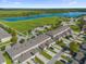 Aerial view of community with lake and green spaces at 1625 Reflection Cv, Saint Cloud, FL 34771