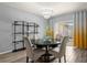 Elegant dining area with a round table and modern chandelier at 1625 Reflection Cv, Saint Cloud, FL 34771