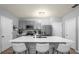 Modern kitchen boasts a large island with quartz countertops at 1625 Reflection Cv, Saint Cloud, FL 34771