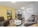 Open living space with accent wall and comfortable seating at 1625 Reflection Cv, Saint Cloud, FL 34771
