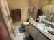 Well-lit bathroom with shower/tub combo and updated vanity at 1631 Edisto Ln, The Villages, FL 32162