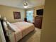Bright bedroom with a queen-size bed and ample closet space at 1631 Edisto Ln, The Villages, FL 32162