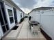 Private patio with seating area, perfect for outdoor relaxation at 1631 Edisto Ln, The Villages, FL 32162