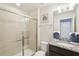 Clean bathroom with shower, granite vanity, and updated fixtures at 2432 Tangier Dr, Kissimmee, FL 34747