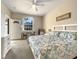 Spacious bedroom with a king-size bed and small table at 511 Pineloch Dr, Haines City, FL 33844