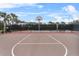 Community basketball court featuring a clean playing surface and well-defined lines at 7642 Fairgrove Ave, Windermere, FL 34786