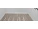 Close up of bedroom carpet with trim, baseboards and door at 1197 Happy Forest Loop, Deland, FL 32720