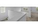 Open upstairs hallway area featuring neutral-toned walls and plush carpet at 1197 Happy Forest Loop, Deland, FL 32720