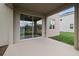 Covered patio with sliding glass doors leading indoors; enjoy easy indoor/outdoor living at 1197 Happy Forest Loop, Deland, FL 32720