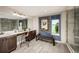 Bathroom featuring double vanity, tile floor, and walk-in shower at 2424 Park Ridge St, Apopka, FL 32712