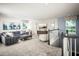 Upstairs loft area features comfortable seating, natural light, and stylish decor at 2424 Park Ridge St, Apopka, FL 32712