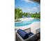 Backyard pool area with lounge chairs and landscaping at 2424 Park Ridge St, Apopka, FL 32712
