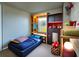 bedroom with built-in bunk bed and storage at 1312 Hillsborough Ct, Poinciana, FL 34759