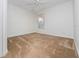 Simple bedroom with neutral walls and carpeted floors at 20505 Queen Alexandra Dr, Leesburg, FL 34748