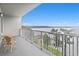 Relaxing balcony offers an expansive view of the lake at 13427 Blue Heron Beach Dr # 405, Orlando, FL 32821