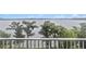 Enjoy the picturesque lake views from the balcony at 13427 Blue Heron Beach Dr # 405, Orlando, FL 32821