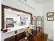 Dining space featuring a view into the kitchen through a pass-through window at 4316 Natchez Trace Dr, St Cloud, FL 34769