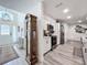 Open floor plan showcasing the entry, kitchen with stainless steel appliances, and a spacious layout at 4316 Natchez Trace Dr, St Cloud, FL 34769
