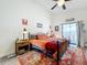 Comfortable main bedroom with a private outdoor patio, modern decor, and plenty of light at 4316 Natchez Trace Dr, St Cloud, FL 34769