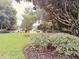 Lush green community space with trees and manicured shrubbery at 3224 Dante Dr # 108, Orlando, FL 32835