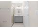Bathroom showcasing a shower with glass door, modern vanity, and a matching toilet at 13455 Sw 85 Pl, Dunnellon, FL 34432