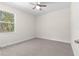 Bedroom with ceiling fan and window at 13455 Sw 85 Pl, Dunnellon, FL 34432