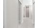 Hallway with modern flooring leads to an accessible shower and closet at 13455 Sw 85 Pl, Dunnellon, FL 34432