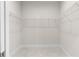 Empty walk-in closet featuring wire shelving and neutral paint at 13455 Sw 85 Pl, Dunnellon, FL 34432
