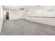 Spacious living area with neutral carpeting, a ceiling fan, and natural light at 10266 Beechwood Ln, Orlando, FL 32832