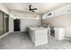 Covered patio includes an outdoor kitchen with built-in grill and countertop bar at 10266 Beechwood Ln, Orlando, FL 32832