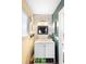 Charming bathroom with a vanity and decorative mirror at 2495 Sedgefield Ave, Deltona, FL 32725