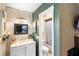 Updated bathroom with stylish chevron tile and a new vanity at 2495 Sedgefield Ave, Deltona, FL 32725