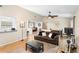 Comfortable living room with a ceiling fan and lots of natural light at 2495 Sedgefield Ave, Deltona, FL 32725