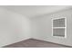 Simple bedroom with carpet flooring and natural light at 5577 Creek Haven Way, Lakeland, FL 33810