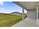 View of a spacious patio and backyard offering a relaxed outdoor living space at 5577 Creek Haven Way, Lakeland, FL 33810