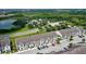 Aerial view of townhouses with community amenities nearby at 154 Captiva Dr, Davenport, FL 33896