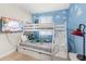 bedroom with bunk beds and TV at 154 Captiva Dr, Davenport, FL 33896