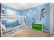 bedroom with bunk beds and Toy Story theme at 154 Captiva Dr, Davenport, FL 33896