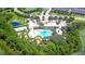 Aerial view of community pool and surrounding landscape at 154 Captiva Dr, Davenport, FL 33896