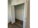 Open closet with wire shelving and wood-look flooring at 29 W 17Th St, Apopka, FL 32703