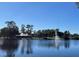 Picturesque lake view with gazebo and fountain at 1707 Terra Cota Ct, Orlando, FL 32825