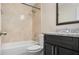 Updated bathroom with tub and granite vanity at 2472 Temple Grove Ln, Kissimmee, FL 34741